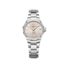 Front-facing view of the Baume & Mercier Riviera M0A10810 ladies' watch, featuring a warm sun satin-finished silver dial with tone-on-tone wave transfers, riveted 5N gilded Roman numerals and indexes, faceted gilded hands, date window at 3 o'clock, polished and satin-finished dodecagonal stainless steel case, and a matching stainless steel bracelet.