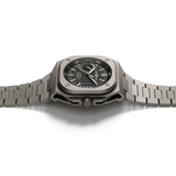 Bell & Ross BR-X5 Automatic 41mm Watch BRX5R-BL-TI/STI features a sapphire crystal case back showcasing the oscillating weight of the COSC-certified BR-CAL.323 movement. The exhibition case back is set within the microblasted titanium case.
