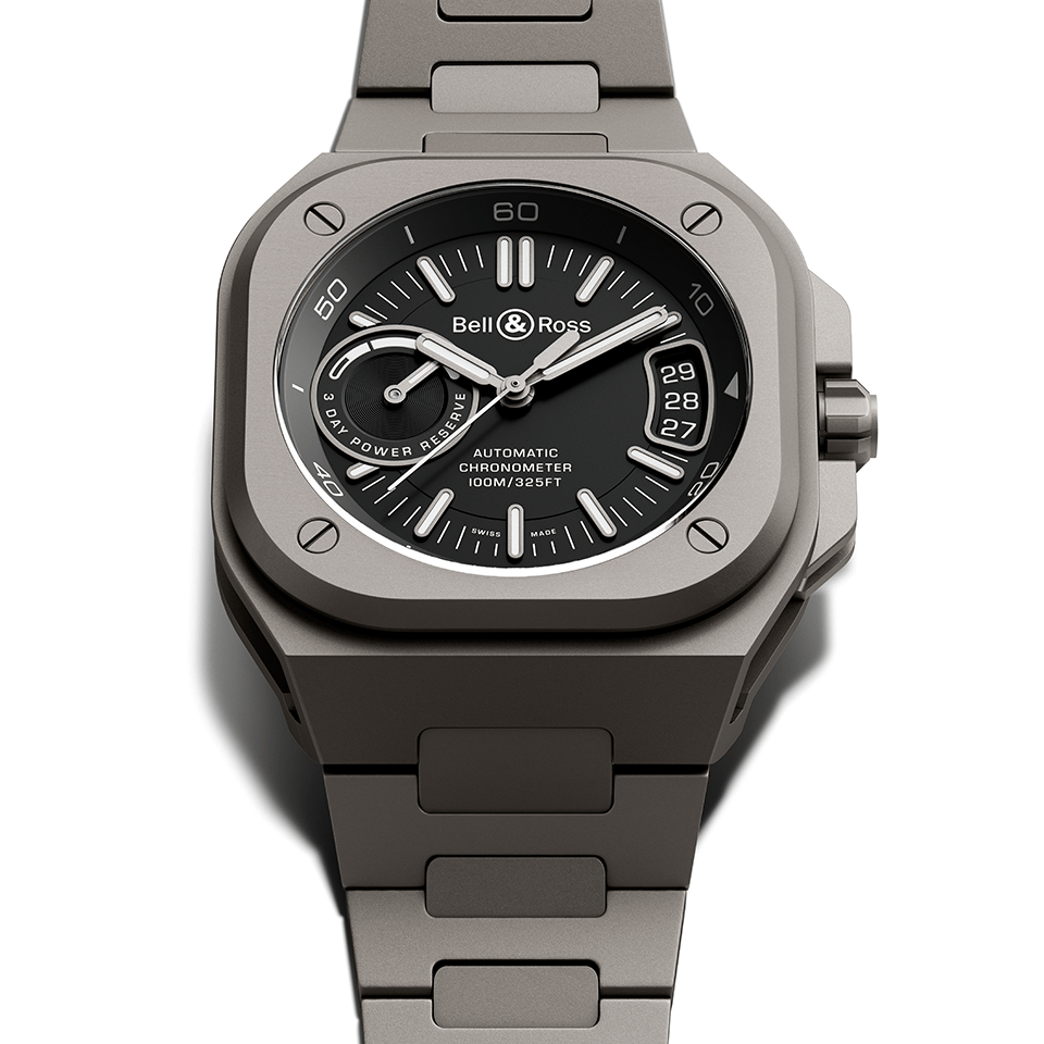 Bell & Ross BR-X5 Automatic 41mm Watch BRX5R-BL-TI/STI reveals fine detailing on the black dial, including the date window at 3 o'clock and the power reserve indicator at 9 o'clock. The translucent dial construction highlights the Manufacture movement beneath.