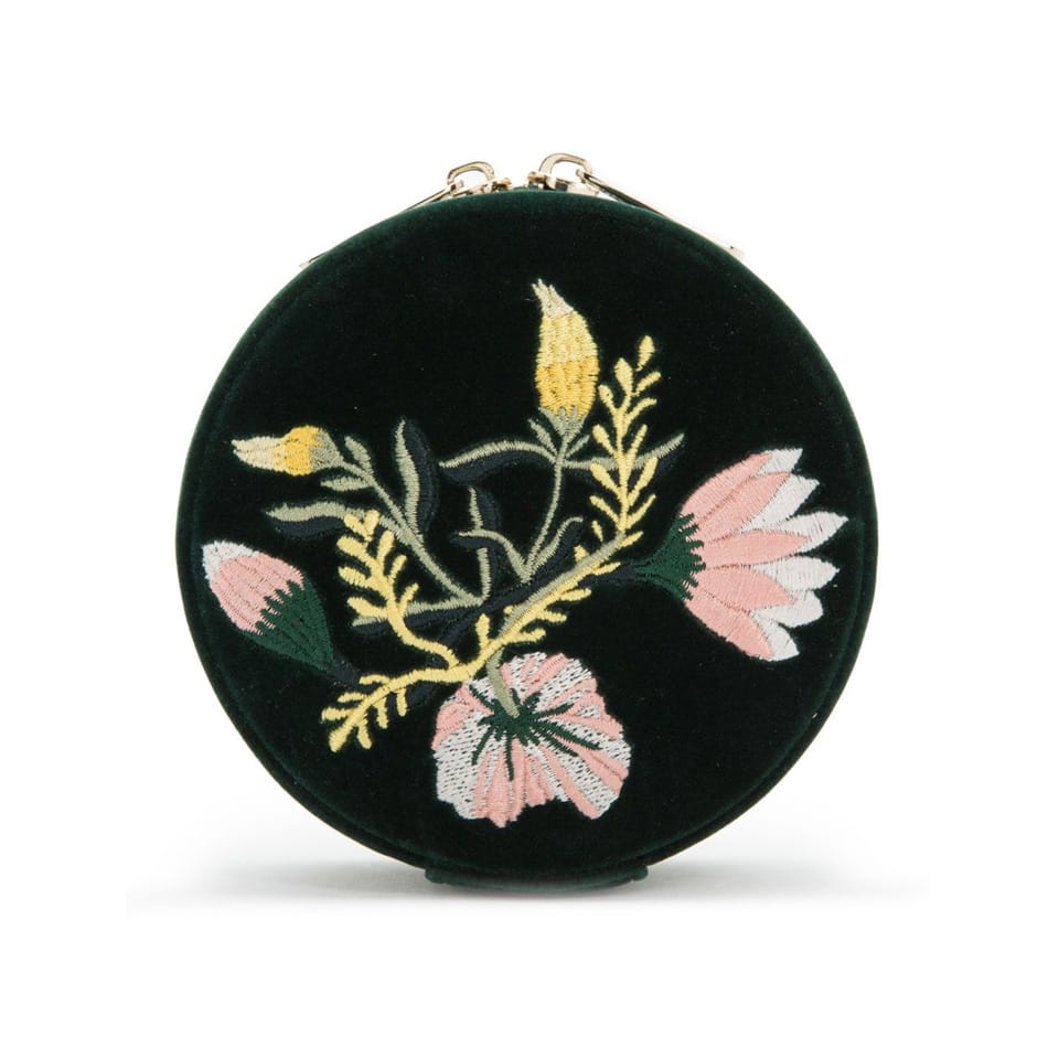 WOLF Zoe Round Forest Green Travel Case, item 393212, shown open to reveal the interior. A round mirror sits in the lid above storage lined with LusterLoc™ to help prevent tarnish.