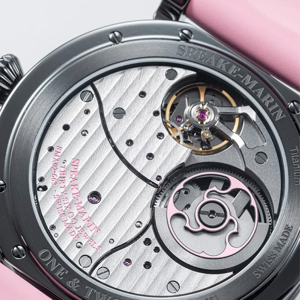 Sapphire case back of the Speake Marin Openworked Dual Time Pink Automatic GMT 42mm Watch 414209430, revealing the in-house SMA02 calibre with fully integrated micro-rotor. This self-winding movement powers both the dual time indication and the retrograde date