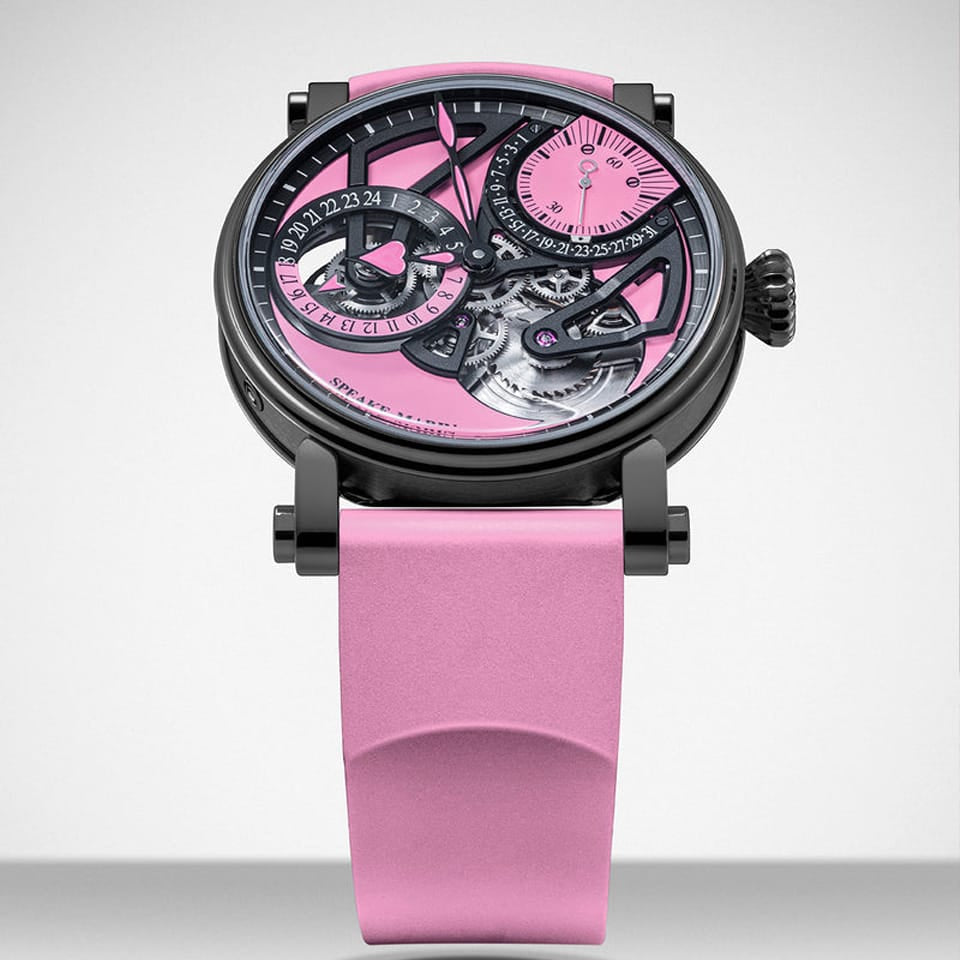 Speake Marin Openworked Dual Time Pink Automatic GMT 42mm Watch 414209430 shown front on, with its vivid pink openworked dial set against a black matte finish. The black DLC-coated Grade 5 titanium Piccadilly case is paired with a pink rubber strap.