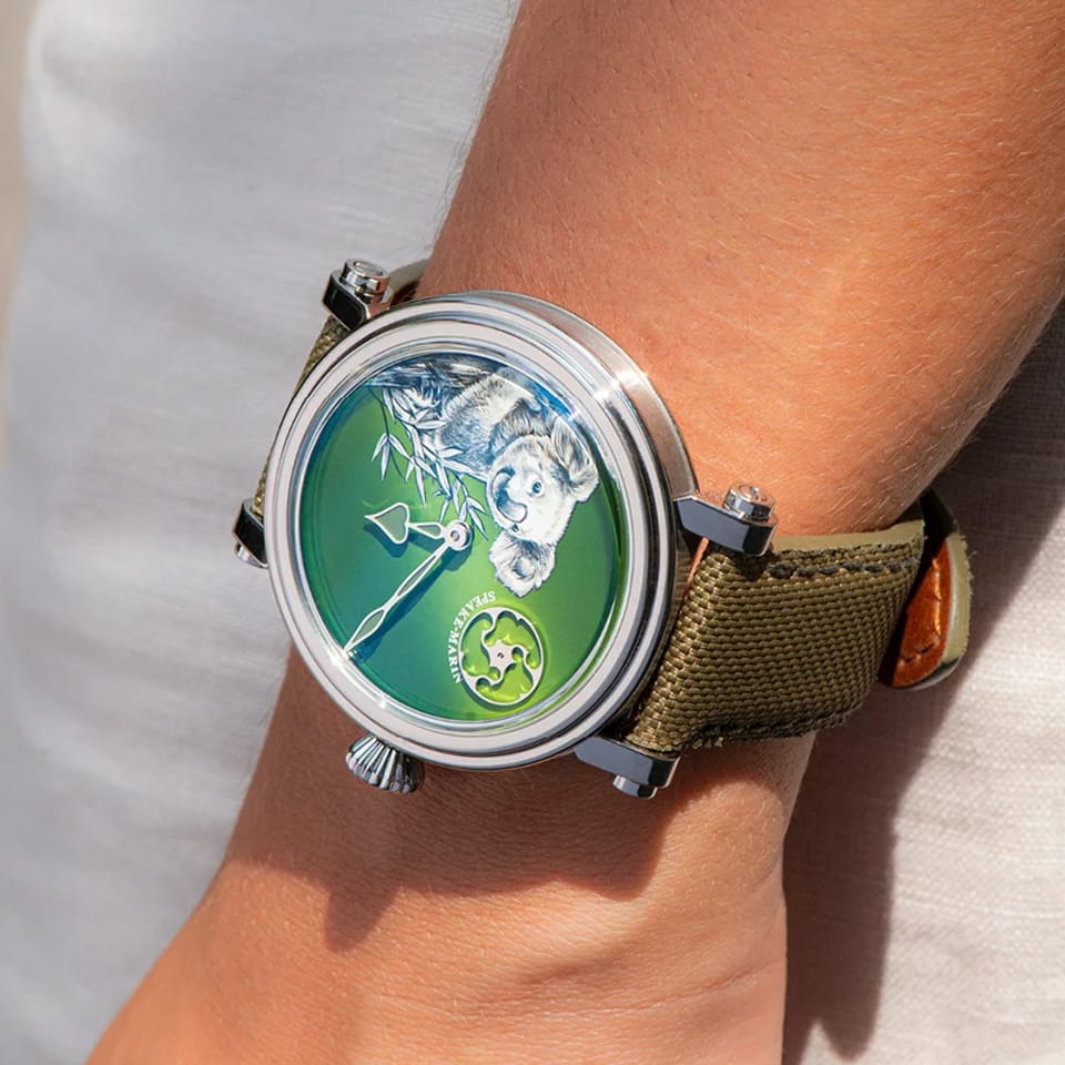Speake Marin Art Series Koala Automatic 42mm Watch 414217420 worn on the wrist, showing its green gradient dial and lightweight titanium case. The green nylon strap and titanium folding buckle complete this limited edition art watch.