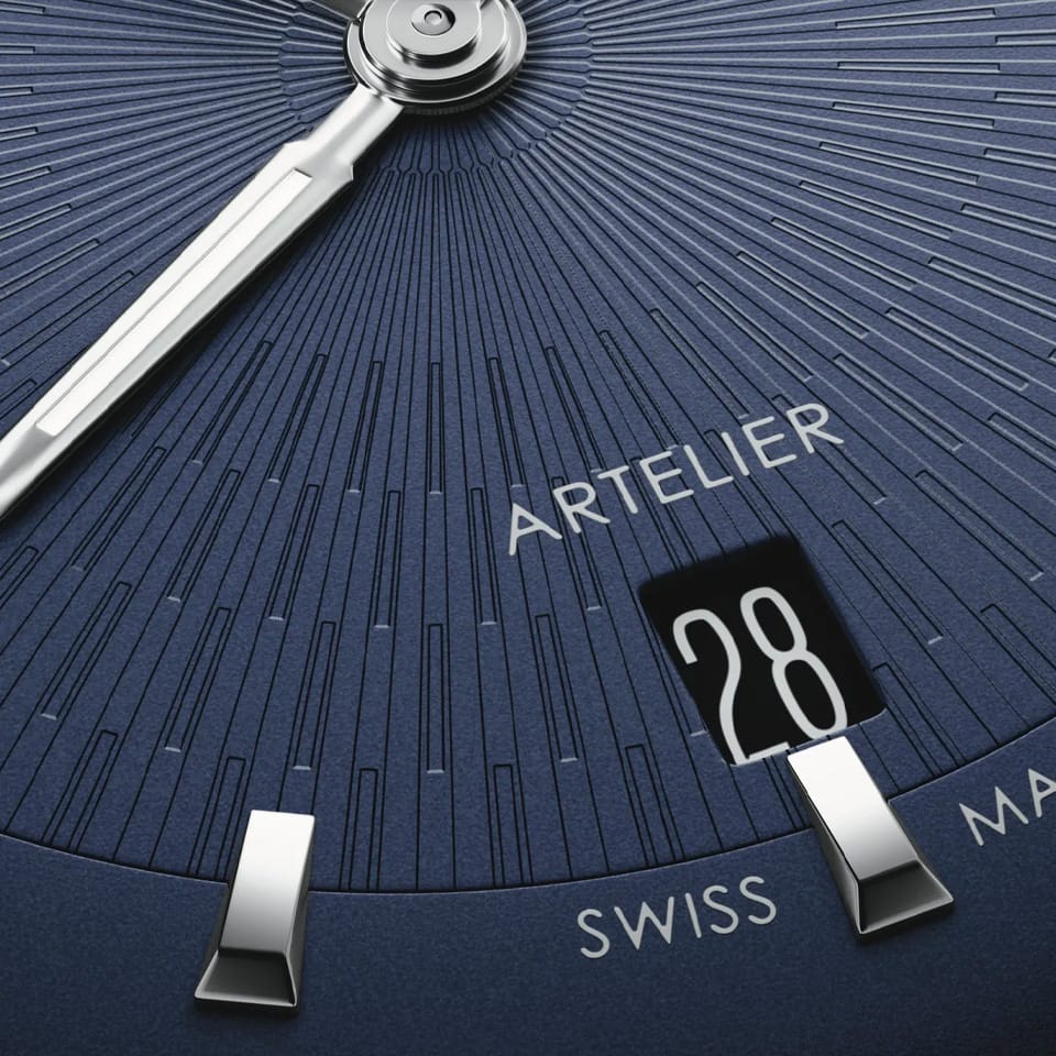 Oris Artelier Date Automatic 38mm Watch 01 733 7810 4055-07 6 20 17FC — A close-up shows the clean baton hour markers and date window against the blue dial's uncluttered surface.