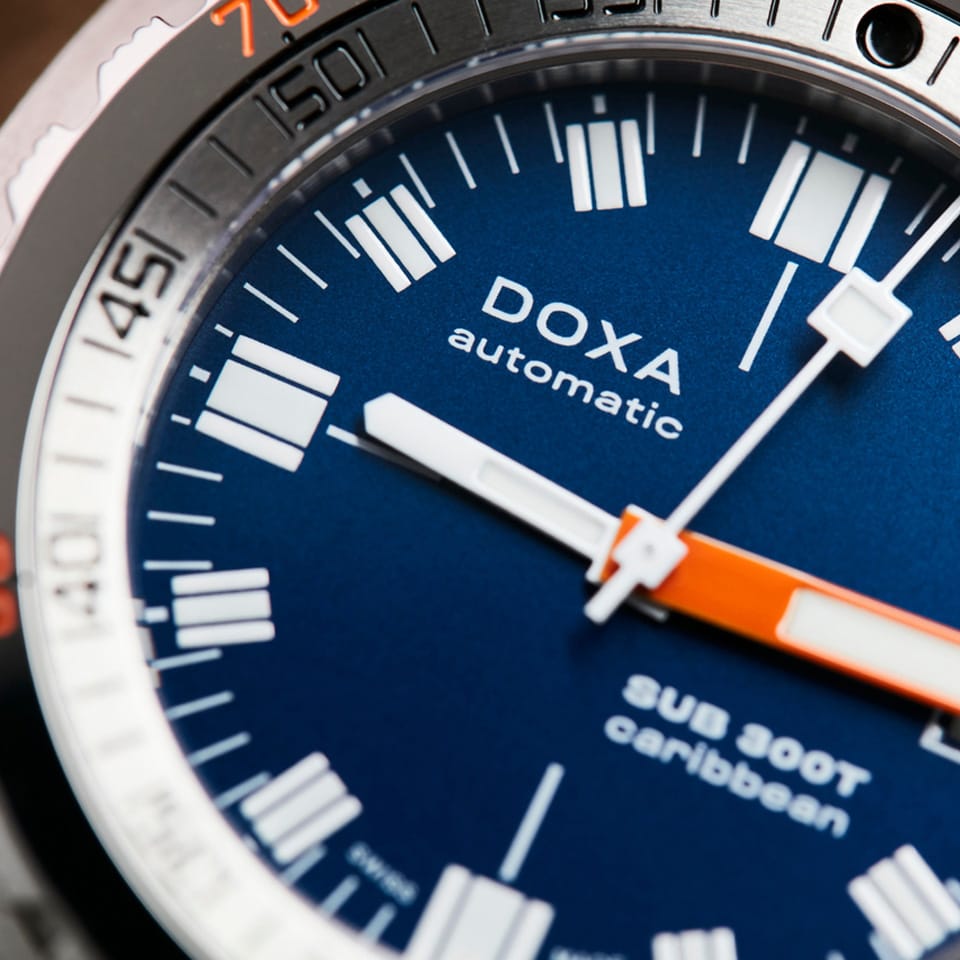 DOXA SUB 300T Caribbean Automatic 42.50mm Watch 840.10.201.10 - close up of dial with orange hour hand