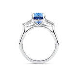 4.62 Carat Zircon and 0.36 Carat TW Diamond Trilogy Ring in 18ct White Gold — Viewed from the front, the ring showcases its trilogy design with the cushion-cut zircon set above tapered baguette diamonds on either side. The 18ct white gold setting frames the stones in a bright, cool tone.