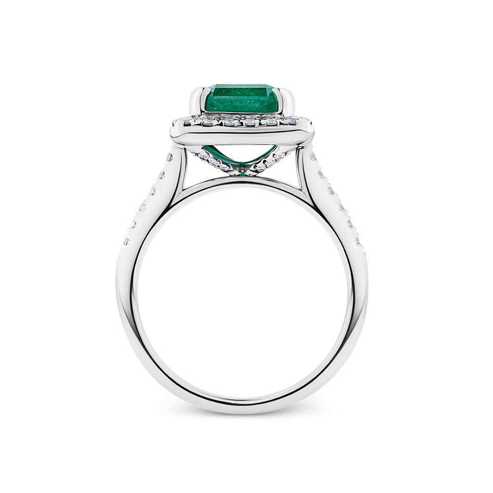 2.59 Carat Emerald and 0.50 Carat TW Diamond Halo Ring in 18ct White Gold