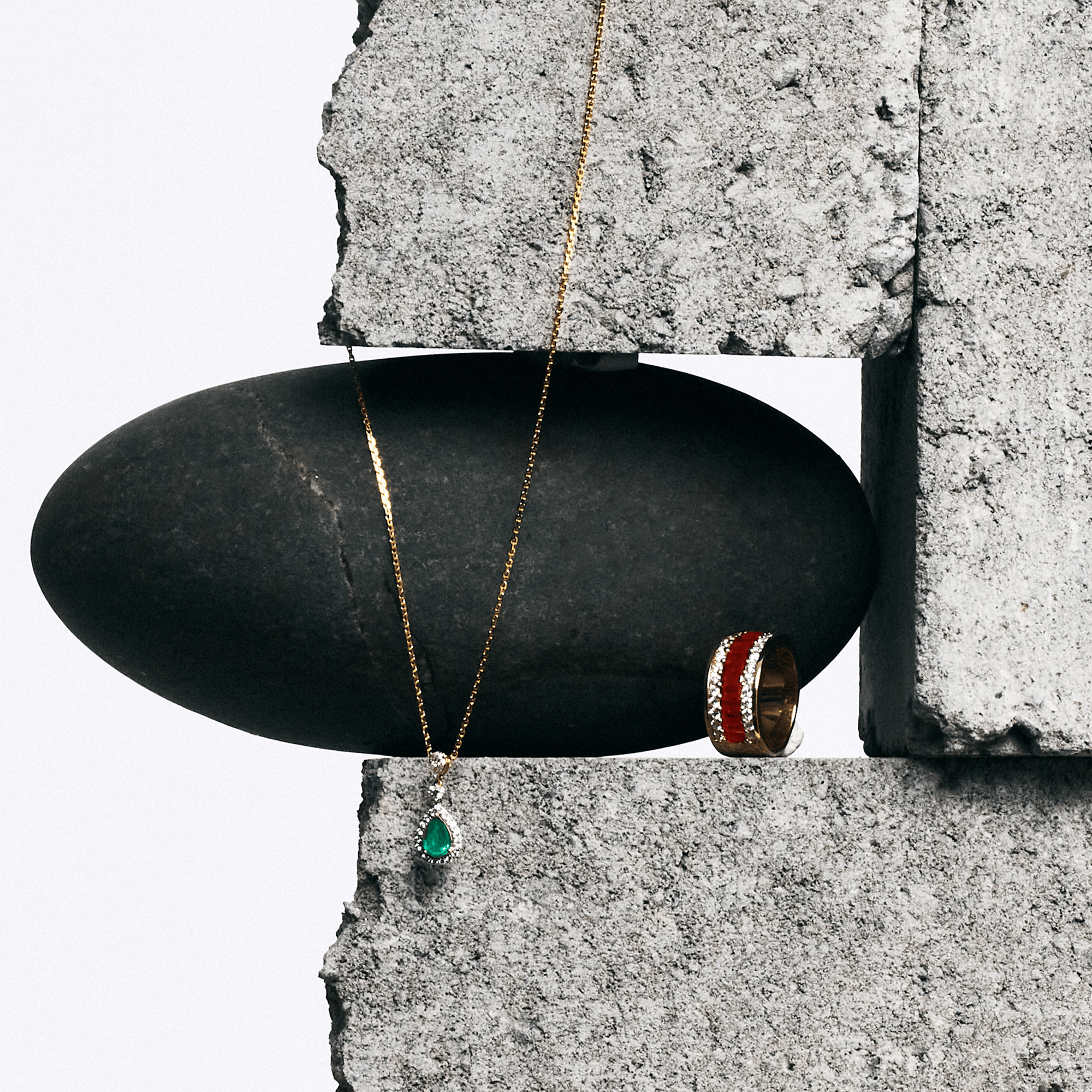 Hardy Brothers Jewellers | Pear Cut Emerald and Diamond Halo Pendant in 18ct Yellow and White Gold