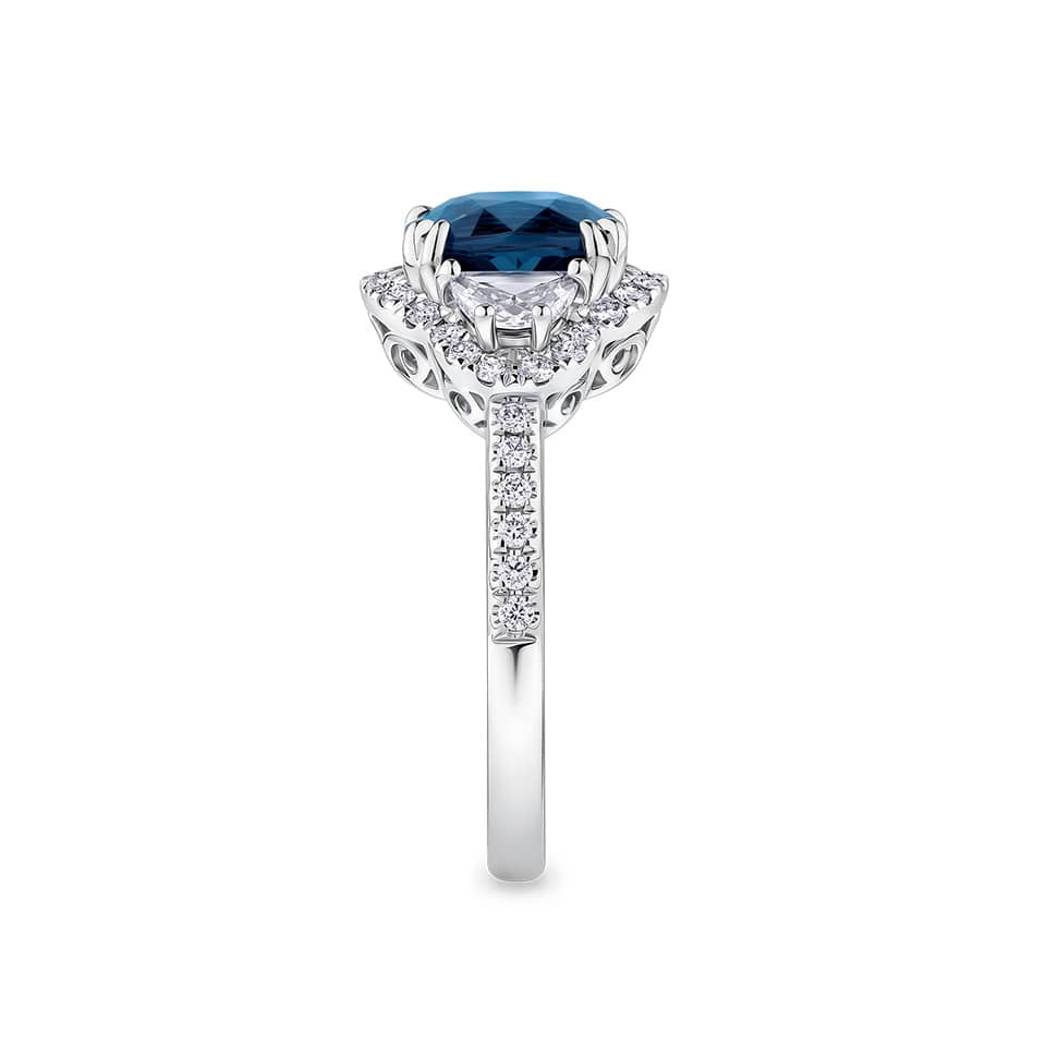 3.16 Carat Sapphire and 0.88 Carat TW Diamond Ring in 18ct White Gold — This side profile highlights the ring's half-moon cut diamond shoulders and the diamonds set along the band. The 18ct white gold band maintains an elegant silhouette from every angle.
