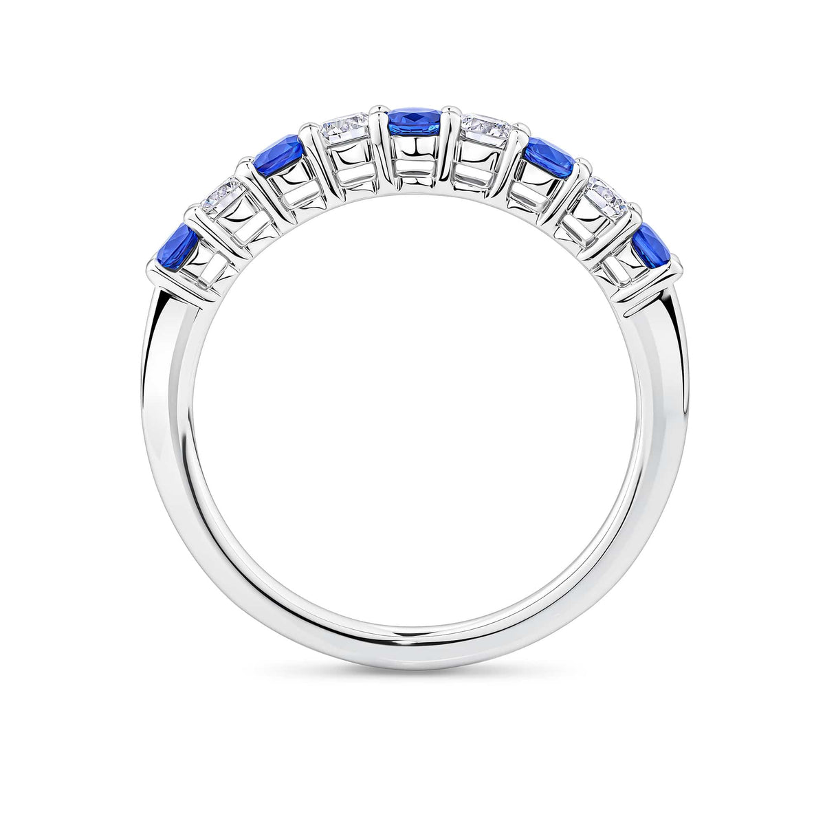 Side view of the Sapphire and Diamond Ring in 18ct white gold by Hardy Brothers, highlighting the claw-set stones and polished band.
