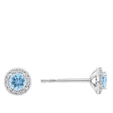Close-up detail of the Halo Aquamarine and Diamond Stud Earrings in 18ct white gold by Hardy Brothers, highlighting the claw-set aquamarine and diamond halo design.
