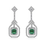 Emerald and 1.05 Carat TW Diamond Drop Earrings in 18ct white gold from Hardy Brothers Jewellers, shown front-on as a pair with their emerald centres and diamond drop design.