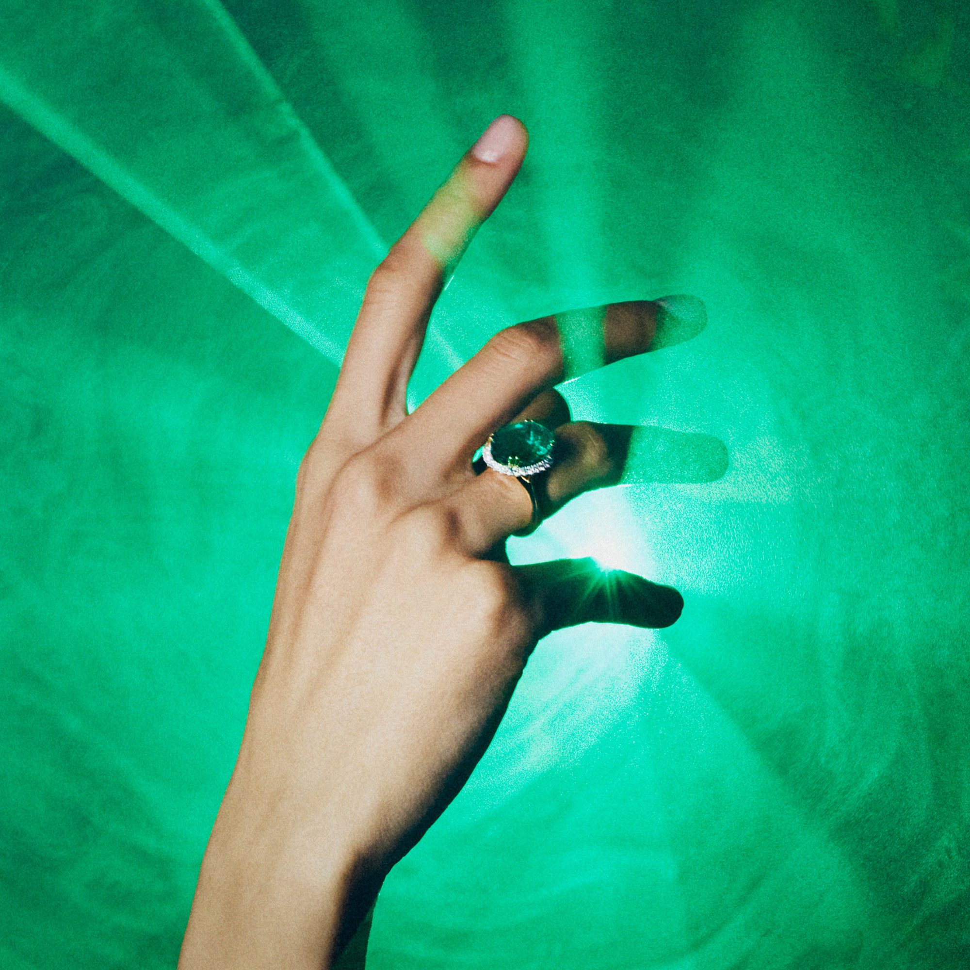 170 Vault Emerald and Diamond Halo Ring in 18ct Yellow Gold