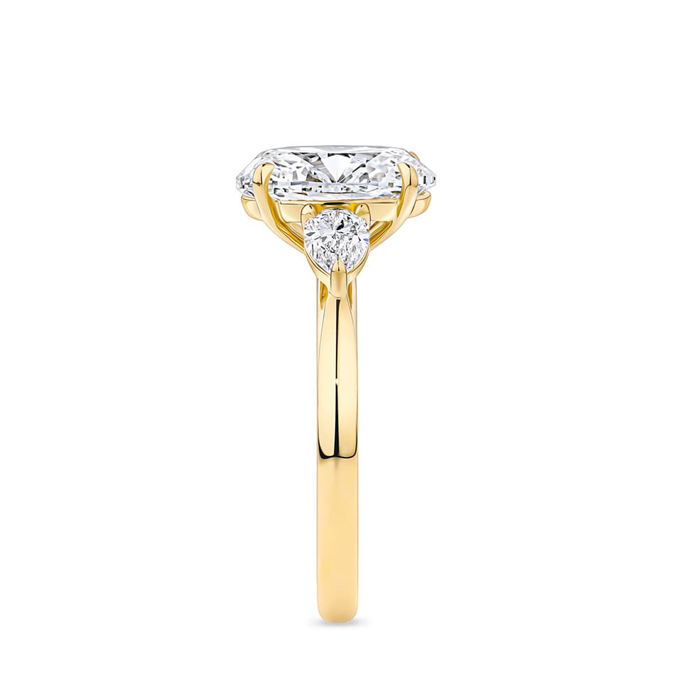 3.50 Carat Oval and Pear Cut Trilogy Engagement Ring in 18ct Yellow Gold