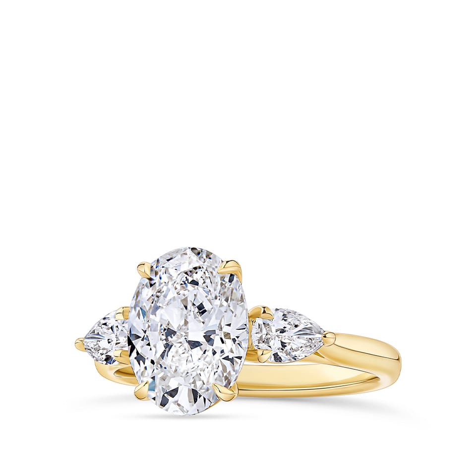 3.50 Carat Oval and Pear Cut Trilogy Engagement Ring in 18ct Yellow Gold