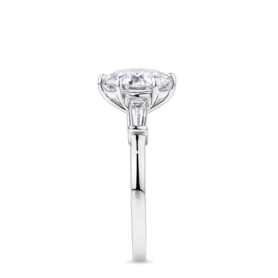 3.02 Carat Round Brilliant and Tapered Baguette Cut Trilogy Engagement Ring in 18ct White Gold