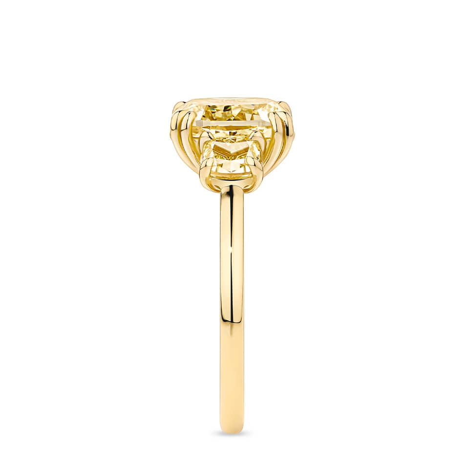 4.66 Carat Fancy Yellow Diamond Cushion Cut Trilogy Engagement Ring in 18ct Yellow Gold