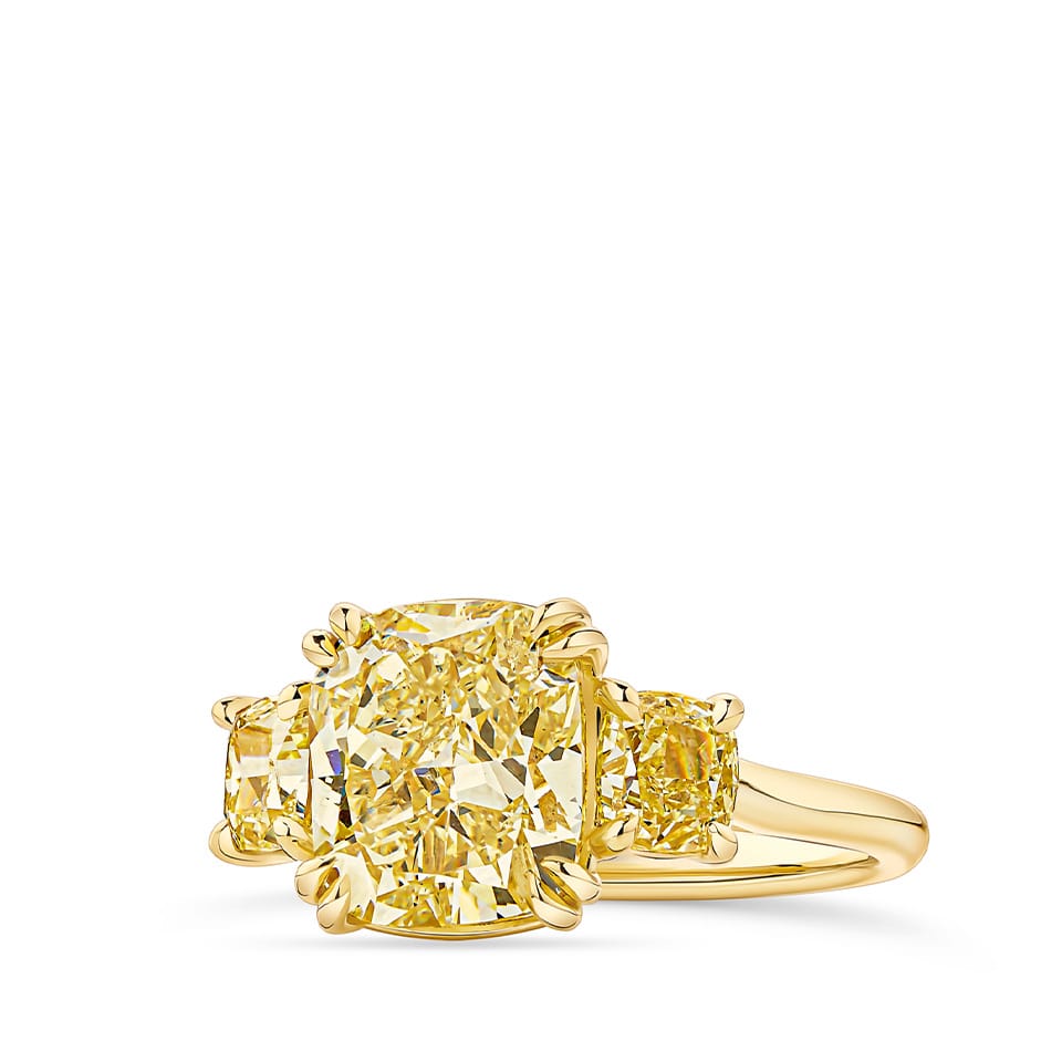 4.66 Carat Fancy Yellow Diamond Cushion Cut Trilogy Engagement Ring in 18ct Yellow Gold