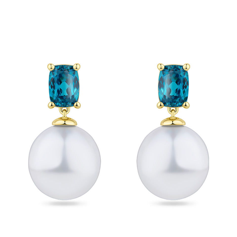 South Sea Pearl and Zircon Stud Earrings in 18ct yellow gold from Hardy Brothers Jewellers, shown front-on as a pair with a blue zircon stud and South Sea pearl drop on each earring.