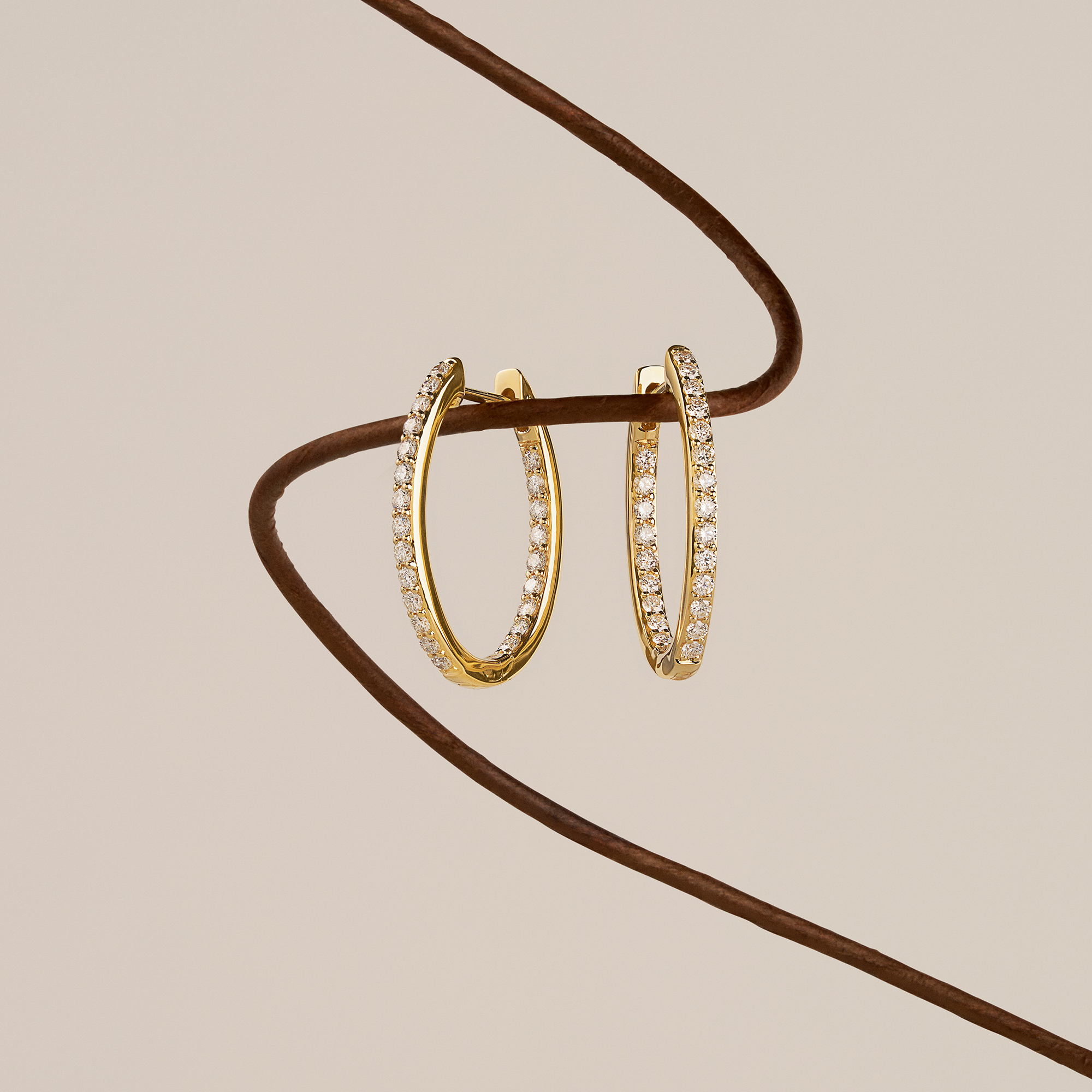 0.50 Carat Diamond Oval Huggie Earrings in 18ct Yellow Gold