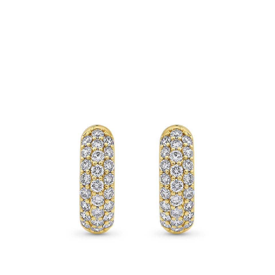 Crafted in 18ct yellow gold, this pair of Quintessential Diamond Pavé Hoop Earrings features 24 round brilliant cut natural diamonds set into each hoop, totalling 48 diamonds and 0.50 carat across the pair.