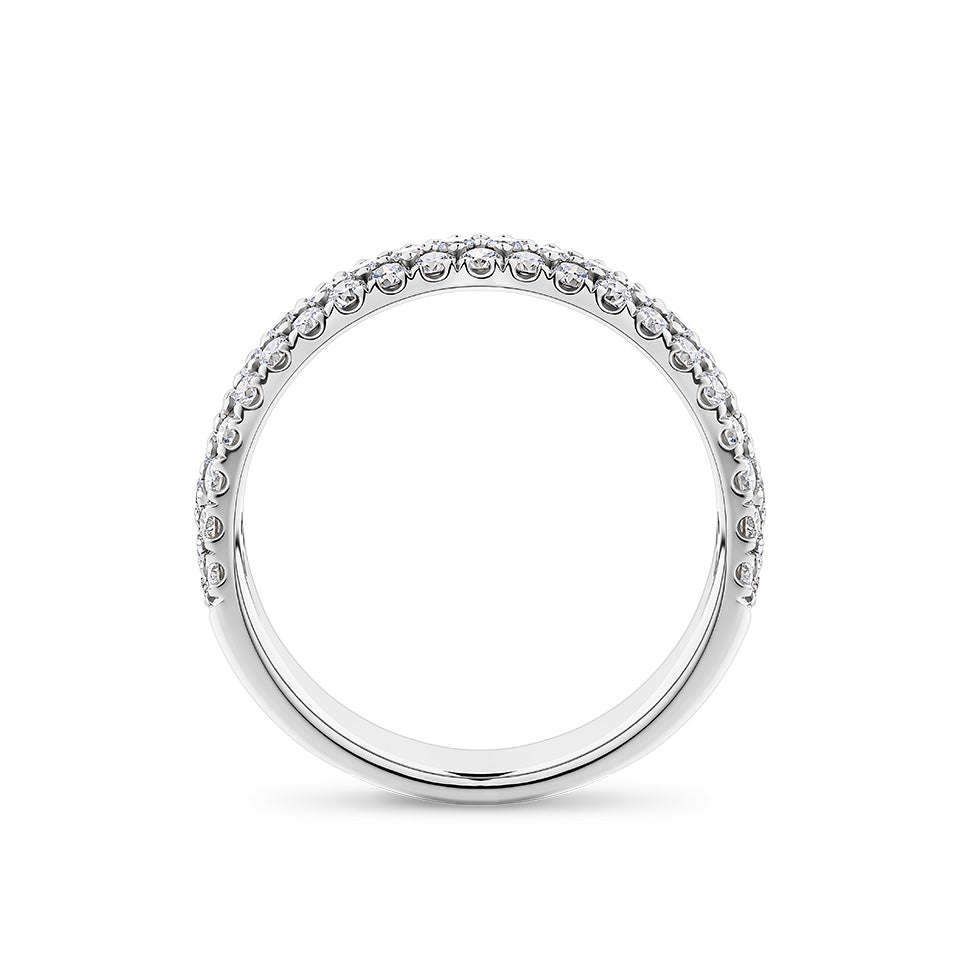 Side view of the Quintessential 1.00 Carat TW Diamond Pavé Ring in 18ct white gold by Hardy Brothers, showing the width of the band and the diamonds set across its surface.