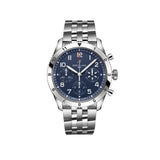 Breitling Classic AVI Automatic Chronograph 42mm Watch A233801A1C1A1 displays its blue dial with large, legible Arabic numerals and a matching knurled bezel. The stainless steel case pays tribute to the Vought F4U Corsair's signature blue livery.