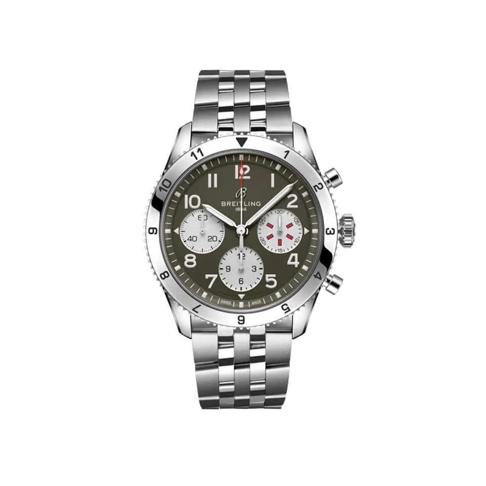 Breitling Classic AVI Automatic Chronograph 42mm Watch A233802A1L1A1 displays its green dial with large, legible Arabic numerals and a matching knurled bezel. The stainless steel case pays tribute to the Curtiss P-40 Warhawk's rugged aviation heritage.