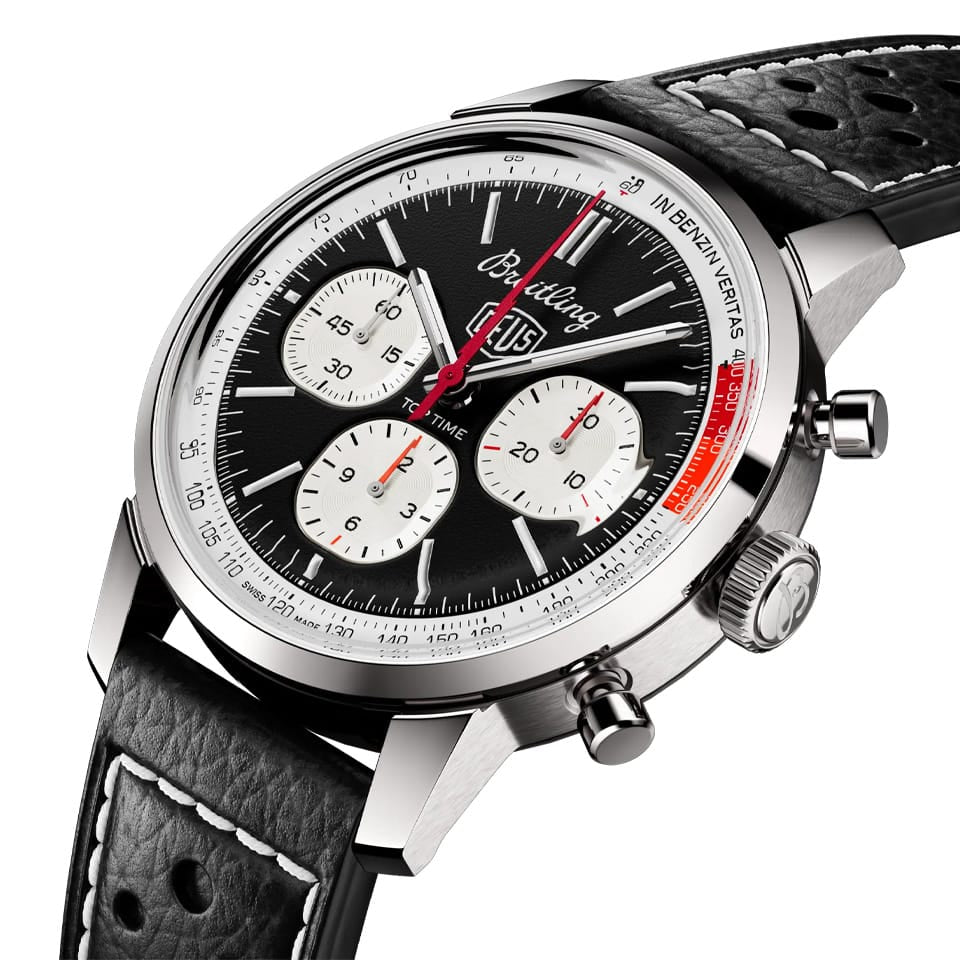 Breitling Top Time Deus B01 Chronograph 41mm Watch AB01765A1B1X1 shows the fixed bezel and cambered sapphire crystal from an angled perspective. The perforated black calfskin racing strap curves into the 41mm stainless steel case.