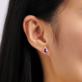 Pear Cut Ruby and Alternating Diamond Stud Earrings in 18ct Yellow and White Gold