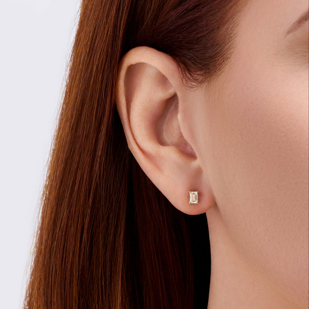0.50 Carat Emerald Cut Diamond Stud Earrings in 18ct Yellow Gold