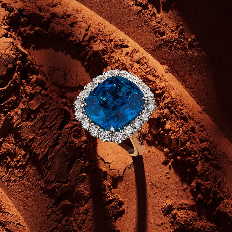 VAULT® 21.91 Carat Cushion Cut Blue Cambodian Zircon and 2.16 Carat Round Brilliant Cut Diamond Halo Ring in 18ct White Gold