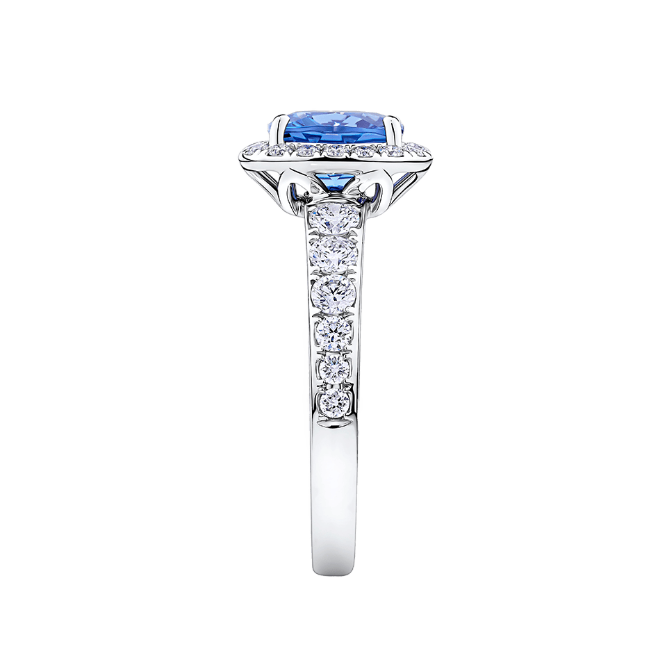 Tanzanite Cushion and Diamond Halo Ring in 18ct White Gold
