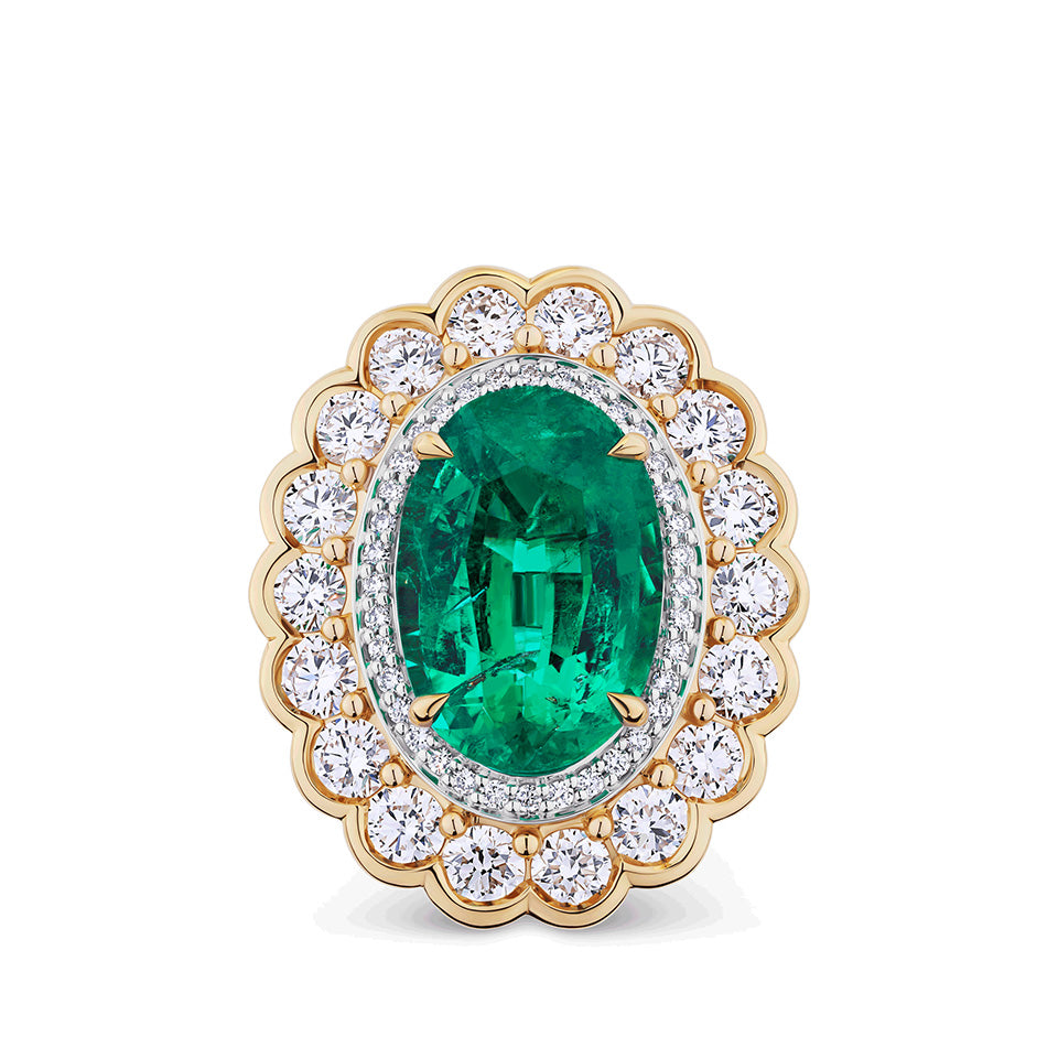 VAULT 7.55 CARAT OVAL CUT COLOMBIAN EMERALD AND 2.90 CARAT DIAMOND HALO RING IN 18CT YELLOW GOLD