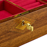 Wooden jewelry box with red interior and gold lock on a white background