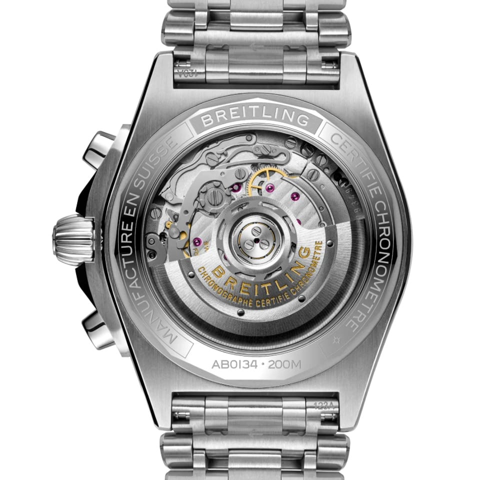 Breitling Chronomat B01 Chronograph 42mm Watch AB0134101C1A1 features a screwed-in sapphire crystal case back revealing the self-winding Breitling Manufacture Caliber 01 movement. The case back sits within the 42mm stainless steel case, measuring 15.1mm in thickness.