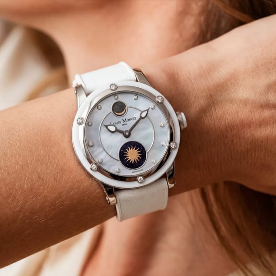 Louis Moinet Skydance Automatic LM-132.20.80 Ladies' Titanium Watch — Worn on the wrist, the 35.6mm case sits gracefully with its satin-textured rubber strap. The dewdrop hour and minute hands remain elegant and legible.