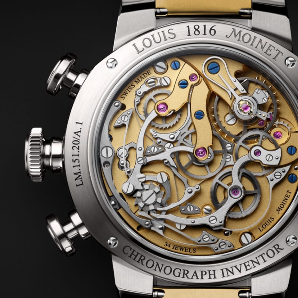 Louis Moinet 1816 Chronograph LM-151.20.30 Men's Titanium Watch — The open caseback reveals the Calibre LM1816 movement, showing satin-finished bridges, blued screws, and the column wheel mechanism. The 330-component chronograph architecture is fully visible.