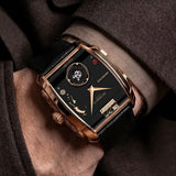 On wrist view of the Jacob & Co. The Godfather II Manual Tourbillon 44mm Watch, reference OP200.40.AA.AB.ABALA, demonstrating the proportions of the 42 x 44mm case against the wrist. The black alligator leather strap contrasts against the 18K Rose Gold case and dial.