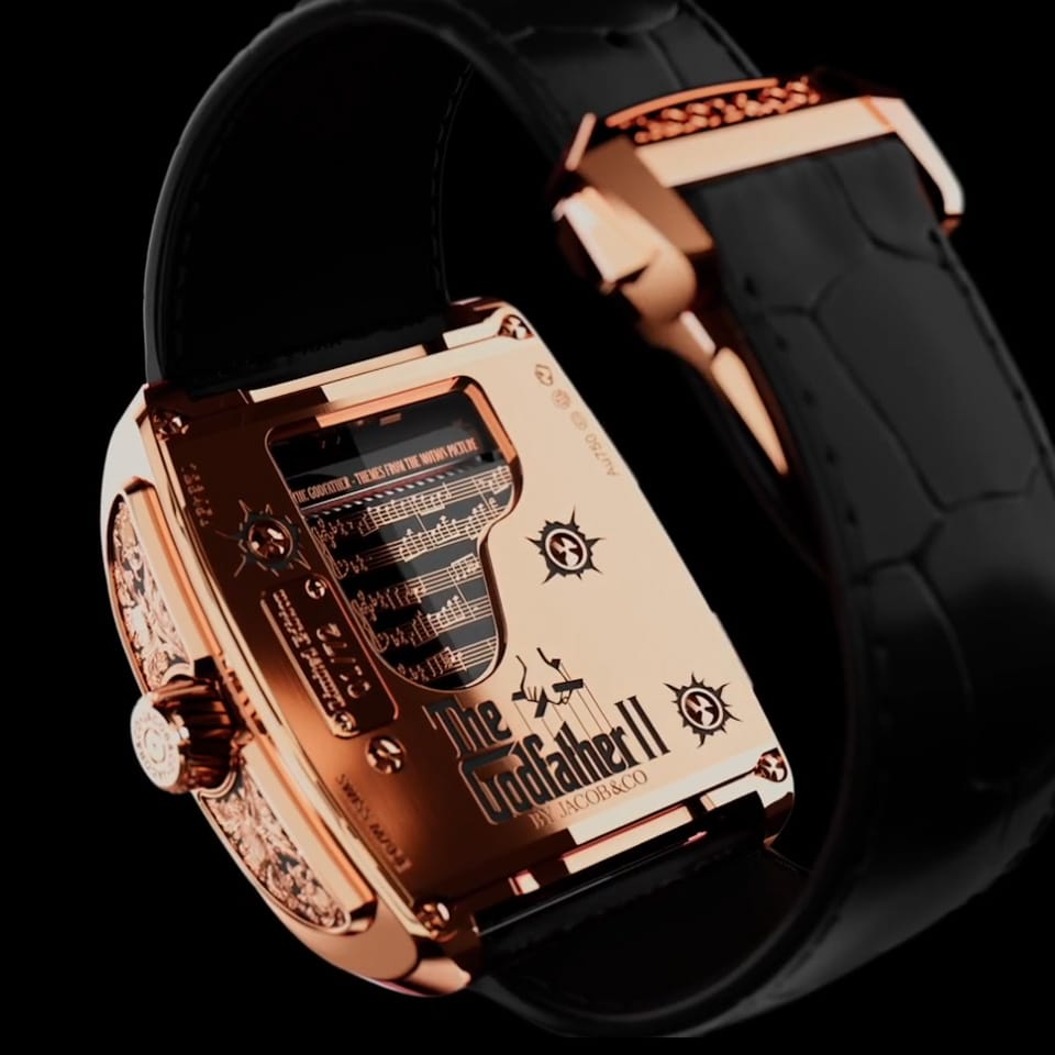 Back of band view of the Jacob & Co. The Godfather II Manual Tourbillon 44mm Watch, reference OP200.40.AA.AB.ABALA, showing the black alligator leather strap where it meets the case. The 18K Rose Gold folding clasp is visible at the strap's closure point.
