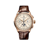 Breitling Premier B25 Datora 42mm Watch RB2510371G1P1 displays its cream dial with a complete calendar showing day, date and month alongside a moon-phase display. The 18k red gold case features rectangular chronograph pushers and Arabic numerals.