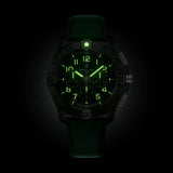 Breitling Super Avenger B01 Chronograph 46mm Watch SB0148101B1X1 shows the luminous properties of its dial markers and hands in low light. The military-inspired carbon dial remains legible against the illuminated ceramic case in dark conditions.