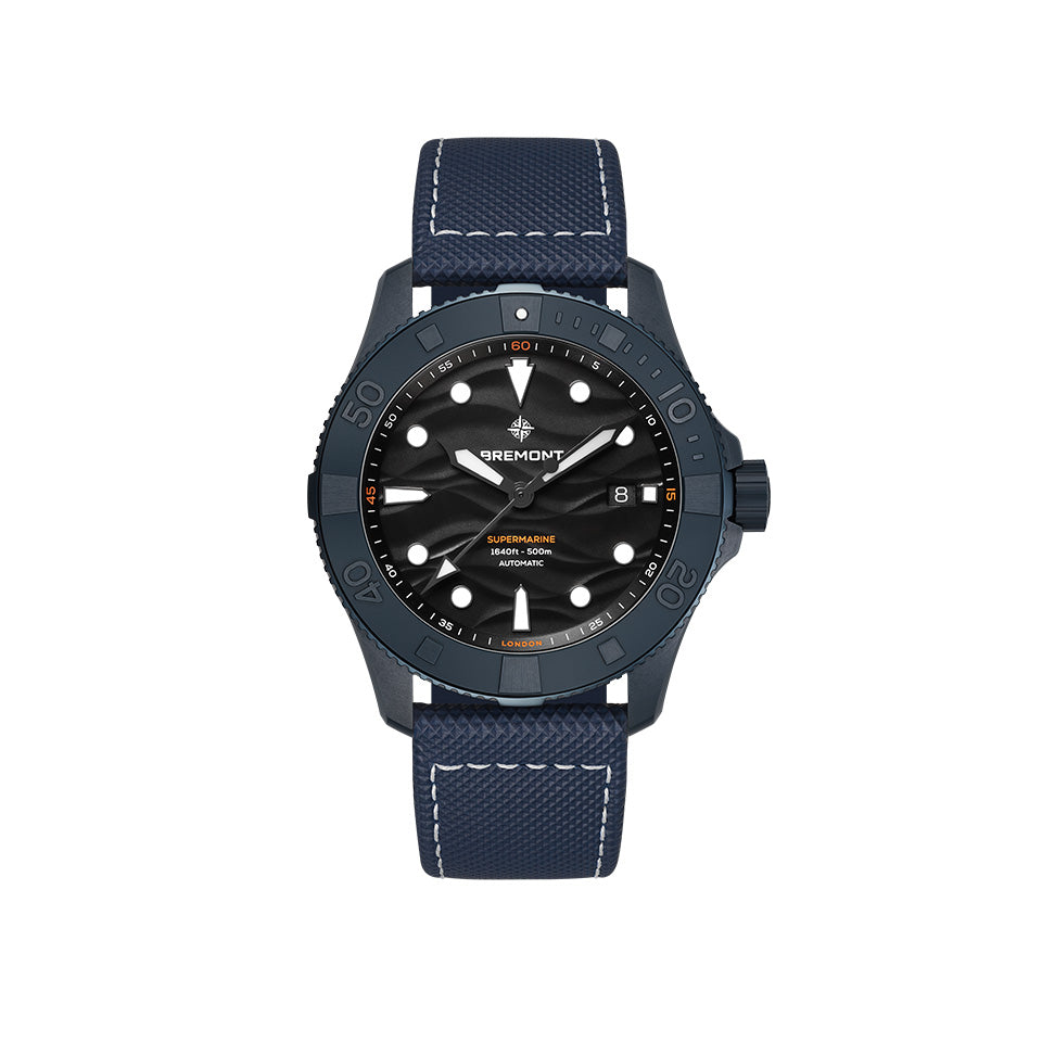 Bremont Supermarine Full Ceramic Deep Blue Automatic Men’s 43mm Watch SM43-DT-BLCER-BK-L-S shown face-on with its black wave-effect dial. Trapezoid indexes flow from the blue ceramic bezel insert onto the dial, with the date window at 3 o’clock.