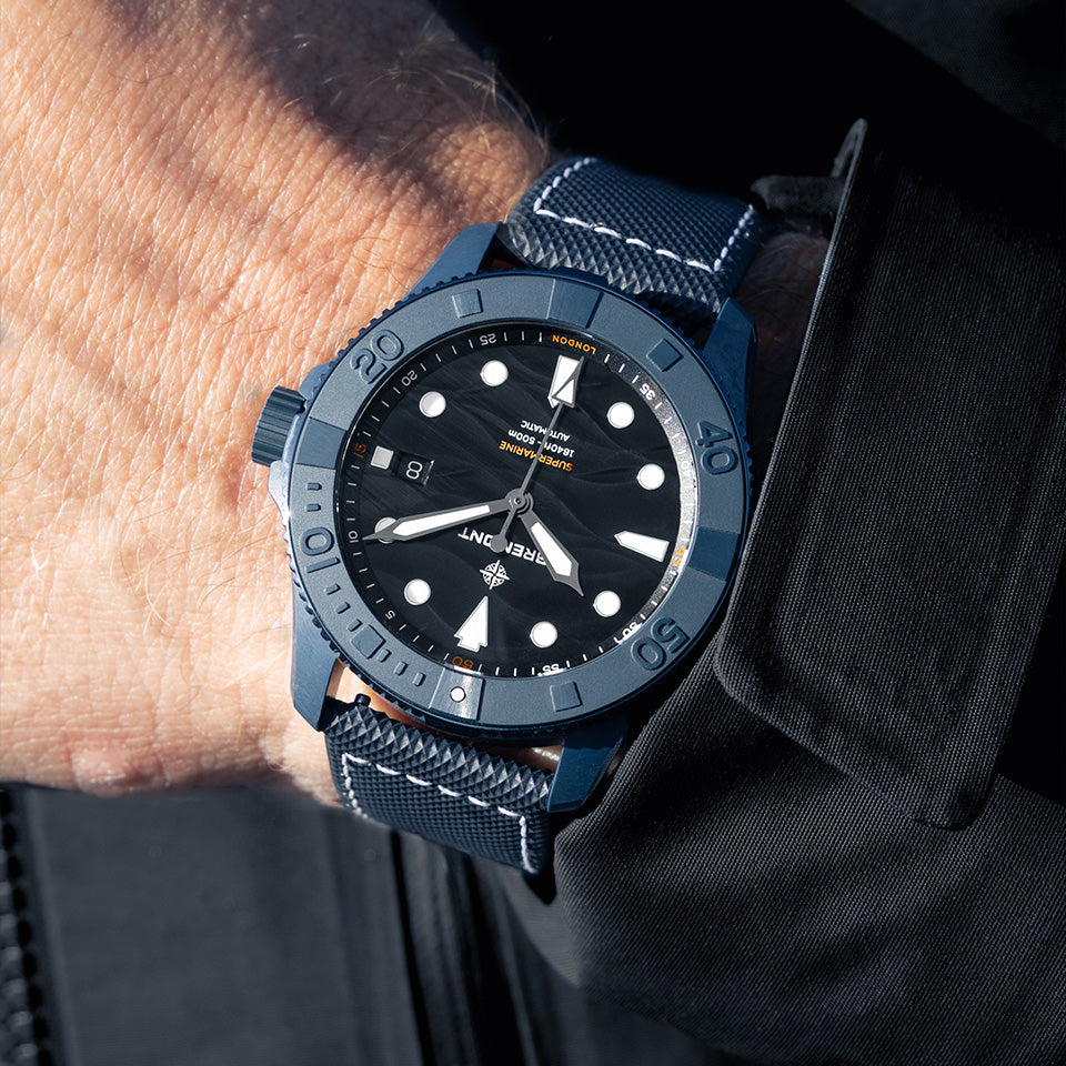 Bremont Supermarine Full Ceramic Deep Blue Automatic Men’s 43mm Watch SM43-DT-BLCER-BK-L-S worn on the wrist. The lightweight blue ceramic case sits on a blue embossed rubber strap with leather lining.