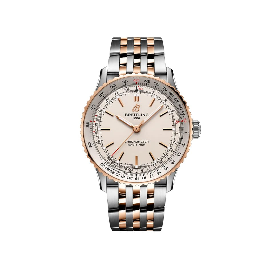 Breitling Navitimer Automatic 41mm Watch U17329F41G1U1 displays its cream dial with the intricate slide rule bezel that defines the Navitimer's iconic look. The notched bezel adds a contemporary touch to the stainless steel and 18k red gold case.