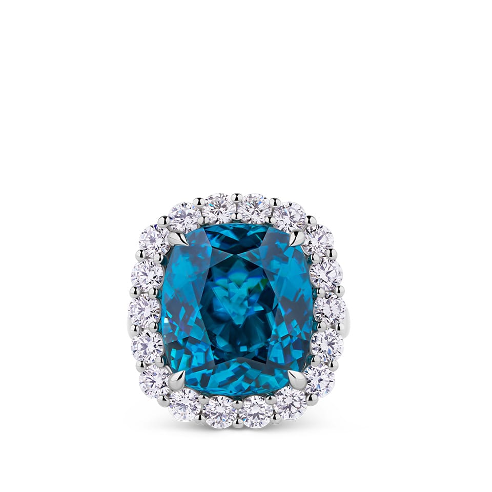 VAULT® 21.91 Carat Cushion Cut Blue Cambodian Zircon and 2.16 Carat Round Brilliant Cut Diamond Halo Ring in 18ct White Gold