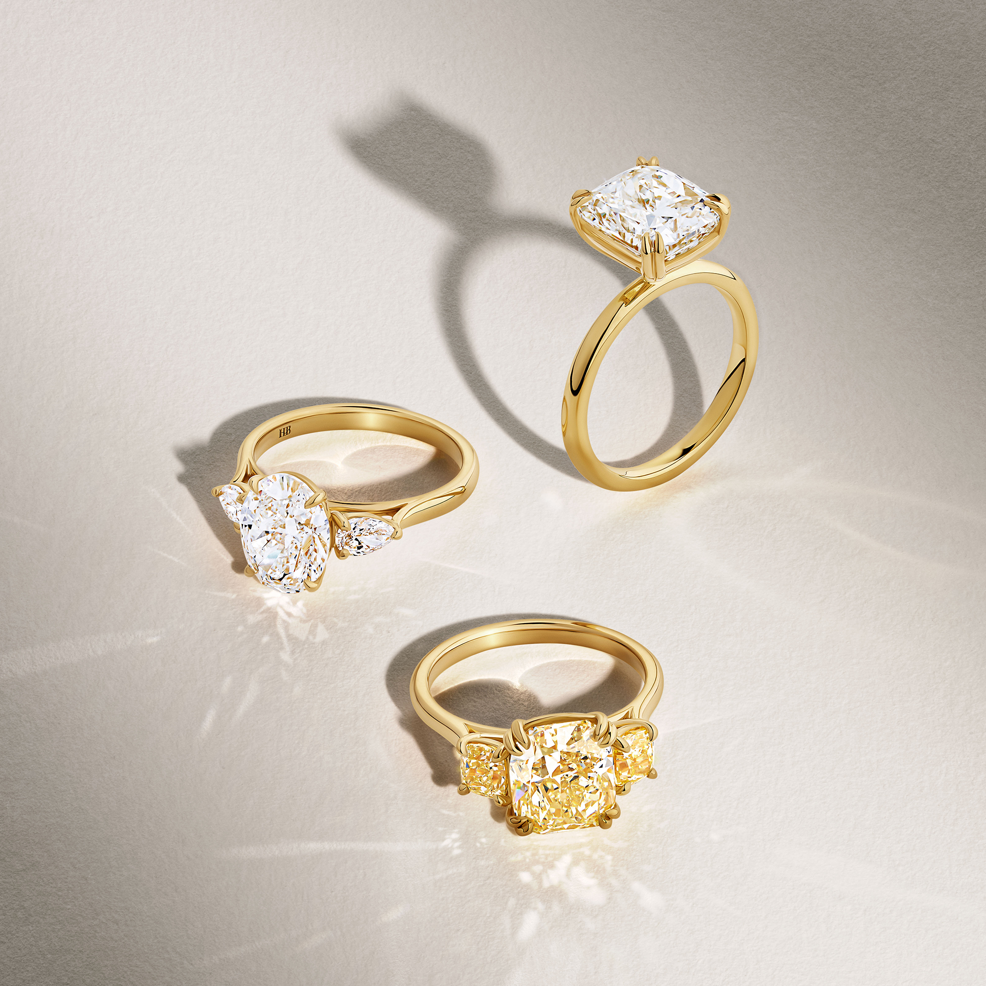 3.61 Carat Fancy Yellow Diamond Cushion Cut Trilogy Engagement Ring in 18ct Yellow Gold