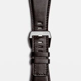 Bell & Ross BR-03 Automatic 41mm Men's Watch, reference BR03A-GB-ST/SCA, showing the back of the brown calfskin leather strap and satin-polished steel pin buckle. An additional black synthetic canvas fabric strap is included with the watch.