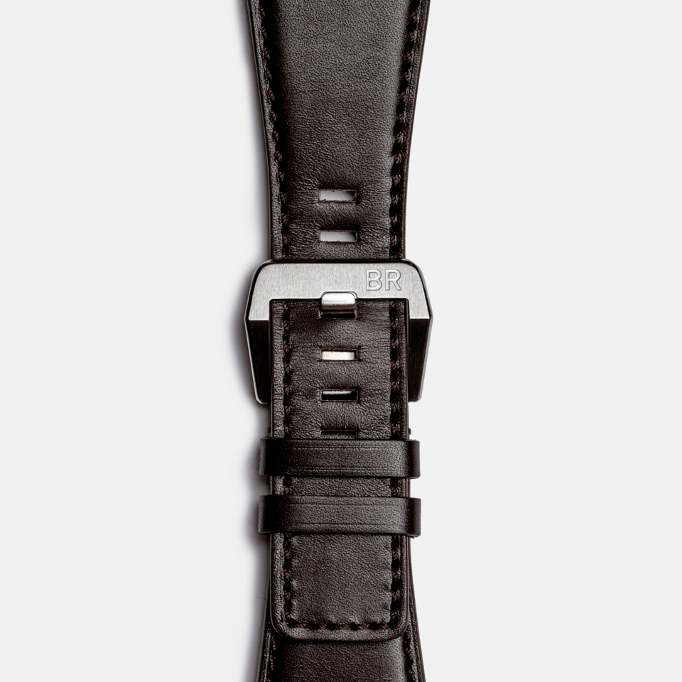 Bell & Ross BR-03 Automatic 41mm Men's Watch, reference BR03A-GB-ST/SCA, showing the back of the brown calfskin leather strap and satin-polished steel pin buckle. An additional black synthetic canvas fabric strap is included with the watch.