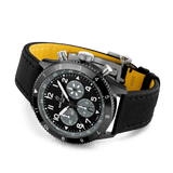 Breitling Super AVI B04 Chronograph GMT 46mm Watch SB04451A1B1X1 reveals the detail of its black military-inspired calfskin leather strap. The titanium folding clasp buckle contrasts against the black ceramic case and strap.